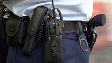 Police holster with radio attached.