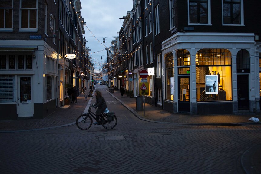 The capital's popular Nine Streets shopping area is near-deserted during lockdown in Amsterdam.