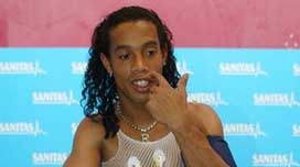 Ronaldinho on exercise bike