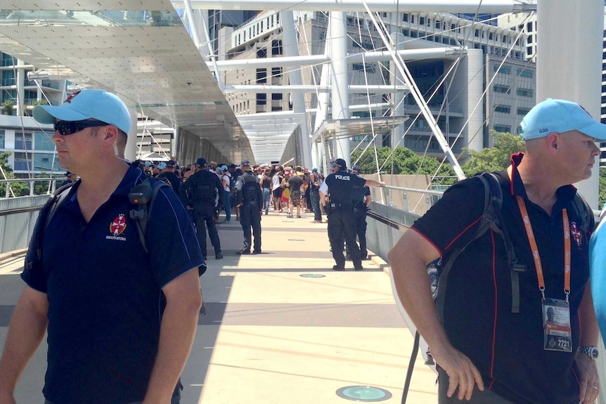 Police negotiators with protest march