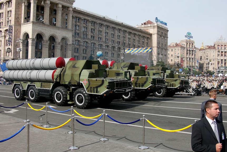 S-300 air defence mobile missile systems drive a street in a military parade. 