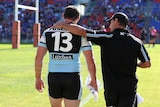 Knee injury ... Paul Gallen leaves the ground after getting injured against the Knights
