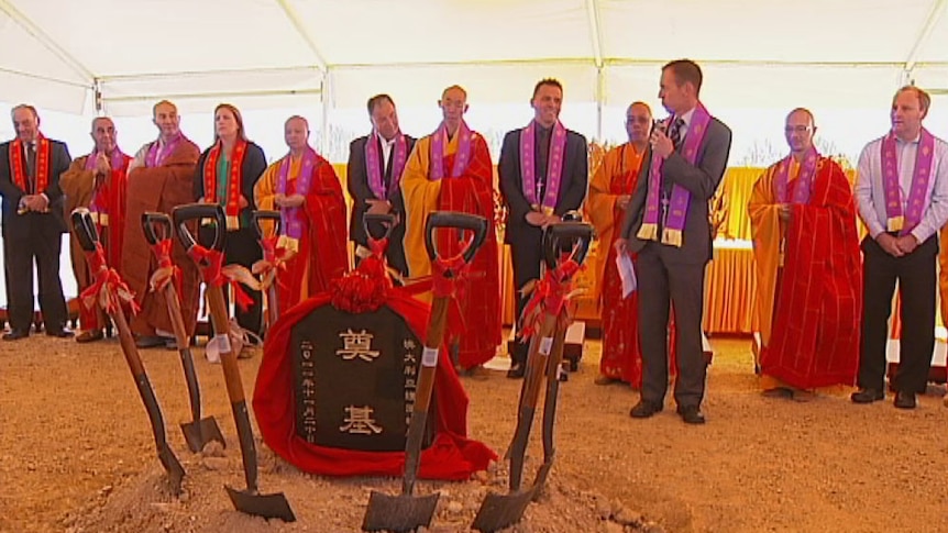 The Chinese community has welcomed the laying of a foundation stone for the Hu Guo Bao En buddhist complex in Gungahlin.