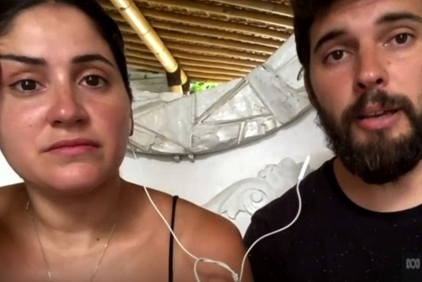 Carolina Castro and Dino Kaist sit together on a web video call.