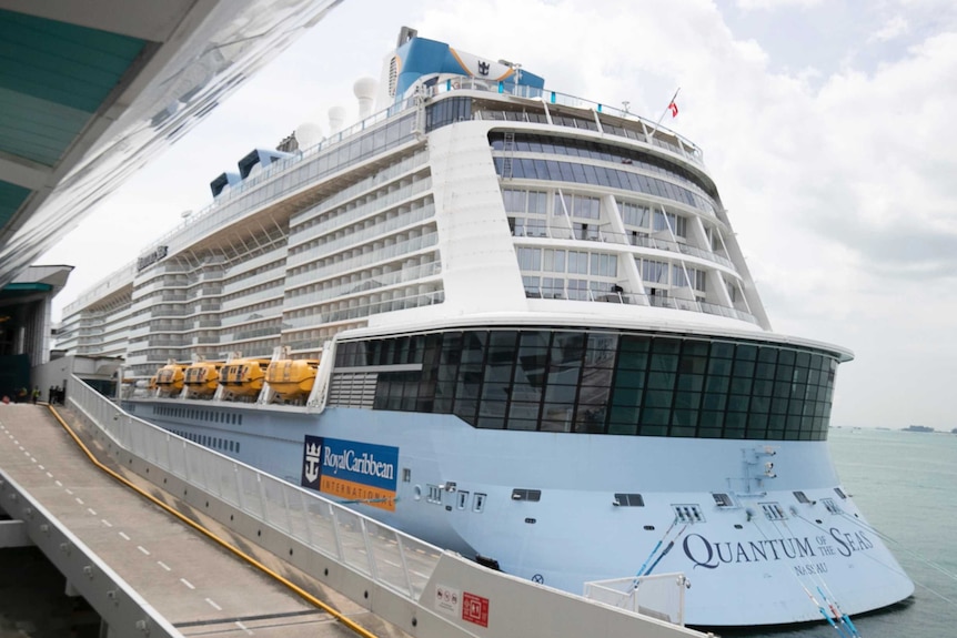 The Quantum of the Seas cruise ship is docked at the Marina Bay Cruise Center Wednesday, Dec. 9, 2020 in Singapore.