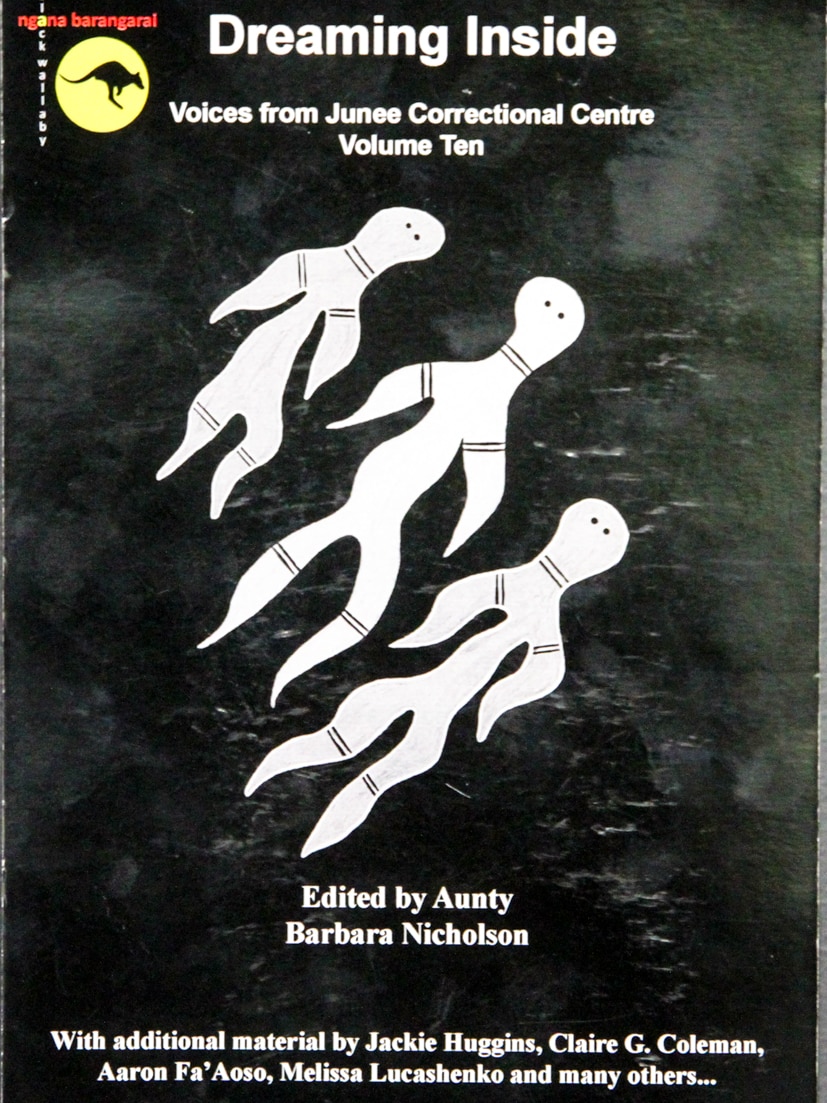 The black cover of a book with white spirit-like shapes.