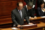 French president Francois Hollande delivers a speech at a special congress.