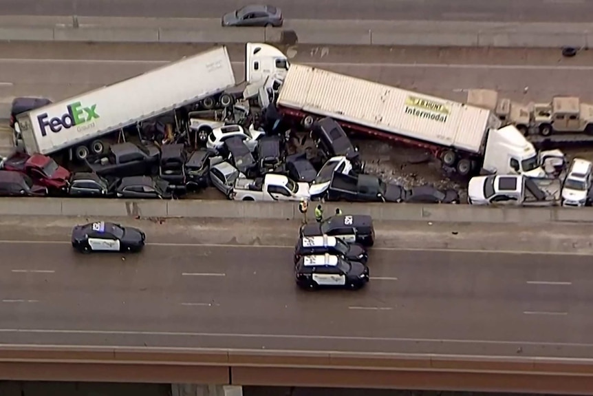 Cars and two trucks piled up on the interstate.