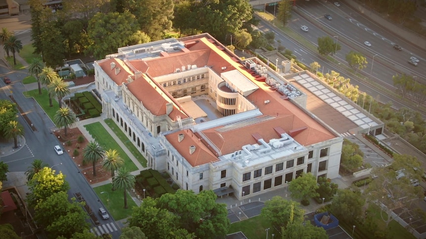 An aerial shot of WA Parliament House at sunset. 