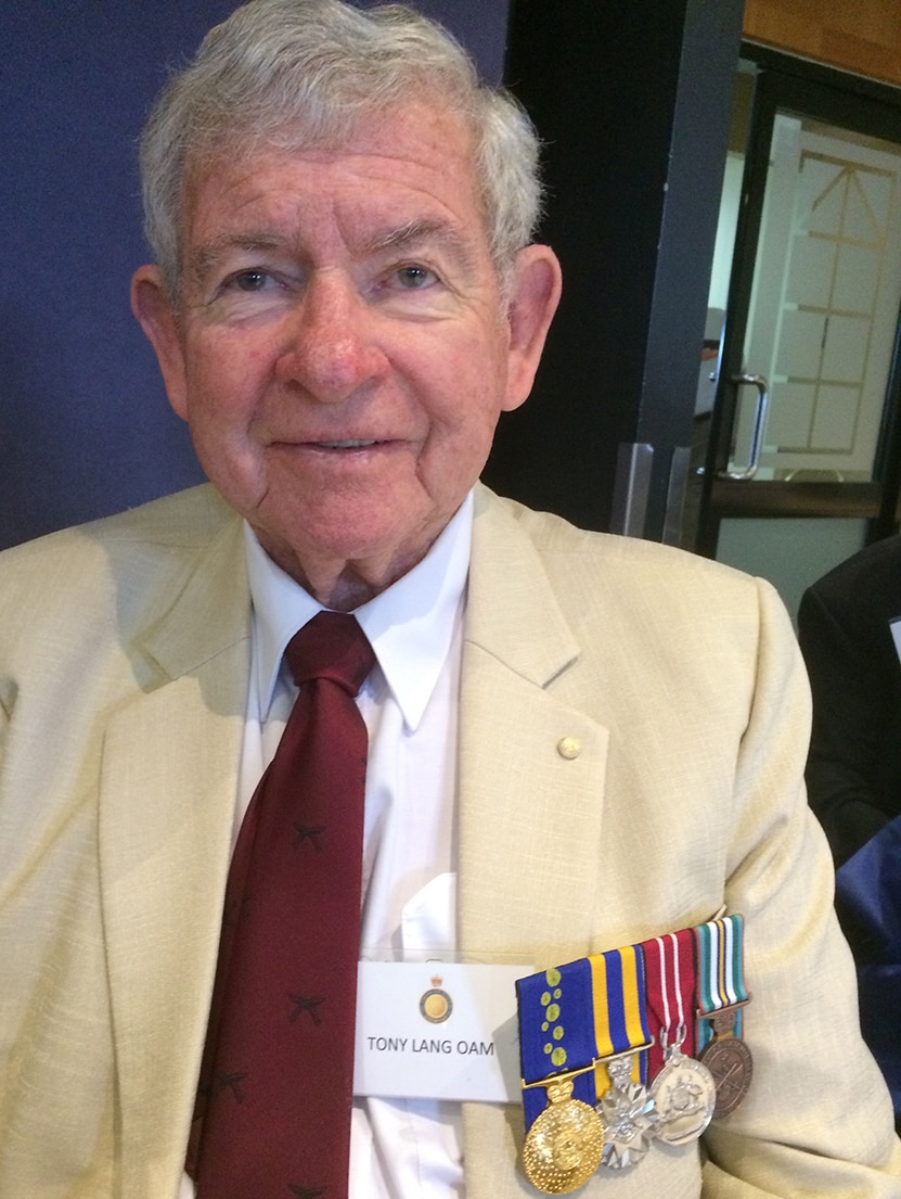 The Reverend Tony Lang wearing military medals.