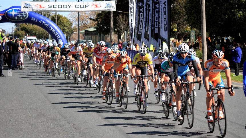 The Tour of the Murray peloton rides through Numurkah, Victoria.