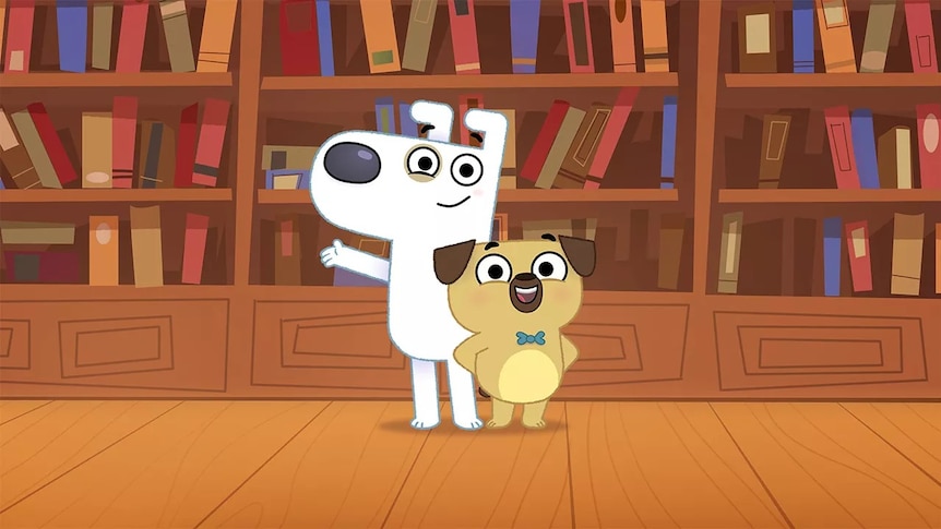 Dog and Pug standing in front of a bookshelf