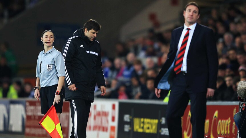 Cardiff manager Malky Mackay (R) on the sidelines against Southampton.