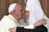 Pope Francis and Patriarch Kirill approach to kiss