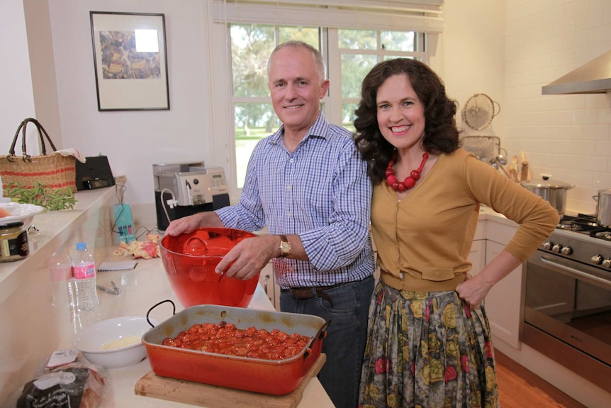 Turnbull and Crabb in kitchen.