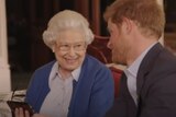 A screenshot of a YouTube video with Queen Elizabeth II and Prince Harry