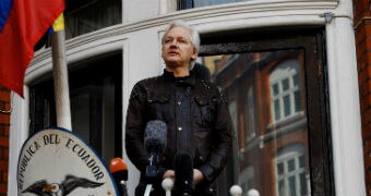 Julian Assange delivers a speech on the balcony of the Ecuadorian Embassy in London.