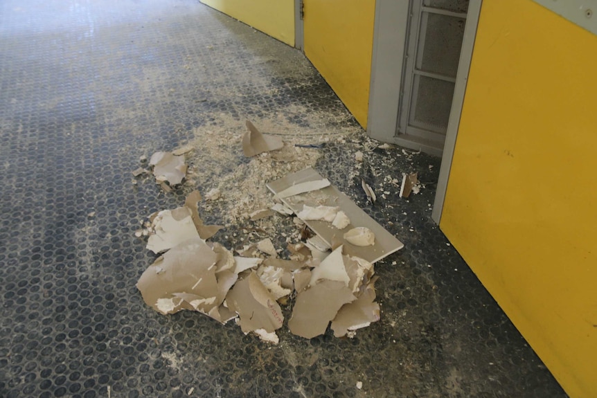 A pile of damaged chipboard-looking material at Banksia Hill Detention Centre.