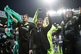 Chelsea manager Antonio Conte celebrates with his players after winning the Premier League title.