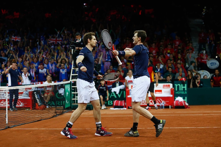 Andy And Jamie Murray celebrate their doubles win for Britain over Belgium in the Davis Cup final