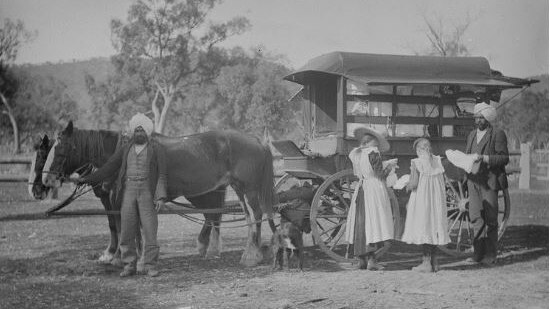A Sikh hawker with his horse drawn wagon delivering goods to country Australia.
