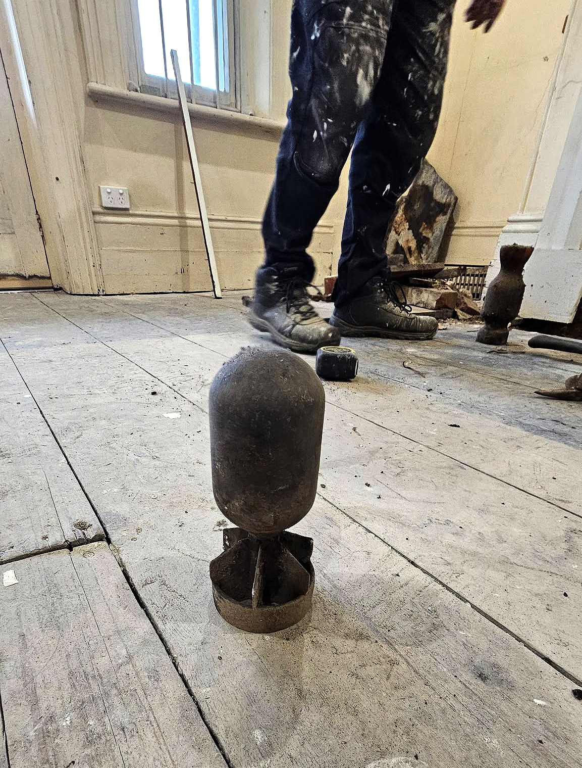 Renovation tradie's fireplace bomb find sets off blasts from the past