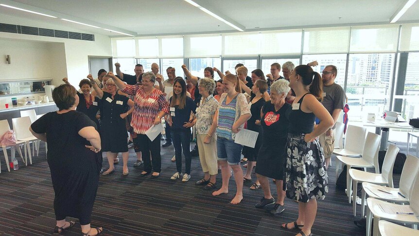 The Absolutely Everybody choir practising "You're the Voice" in Brisbane in March.