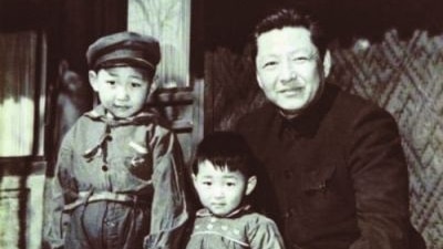 Chinese President Xi Jinping, left, younger brother Xi Yuanping, middle, and father Xi Zhongxun, right.