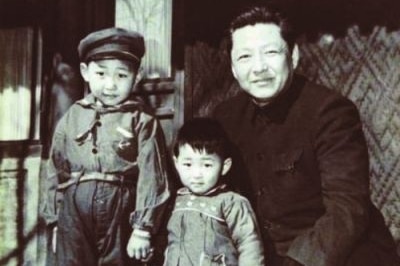 Chinese President Xi Jinping, left, younger brother Xi Yuanping, middle, and father Xi Zhongxun, right.