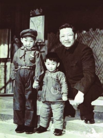 Chinese President Xi Jinping, left, younger brother Xi Yuanping, middle, and father Xi Zhongxun, right.