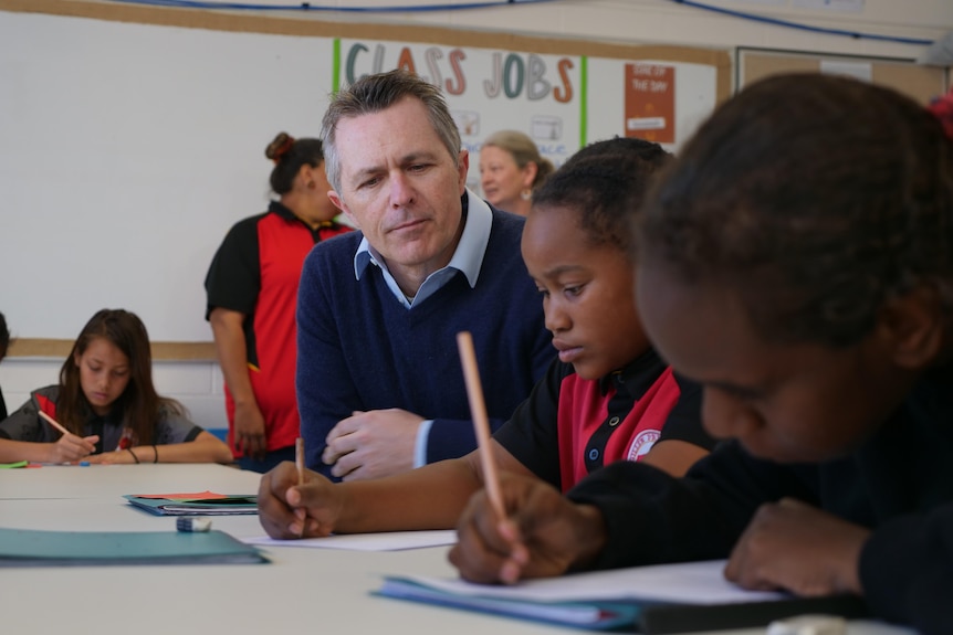 Education Minister Jason Clare in a classroom with students