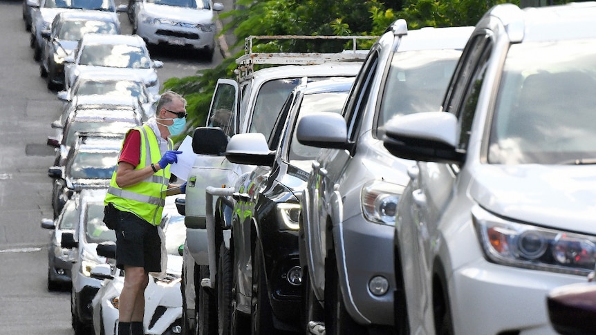 A long line of cars in a queue.