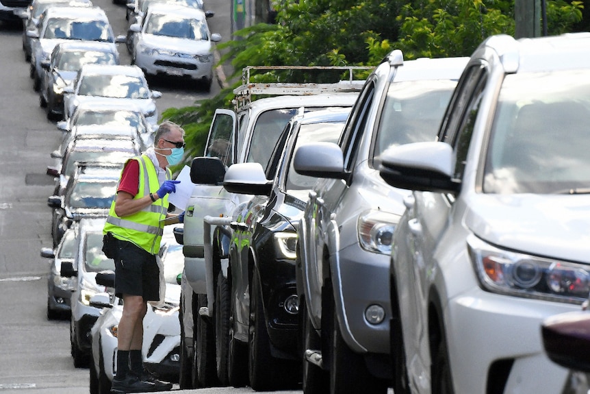 A long line of cars in a queue.