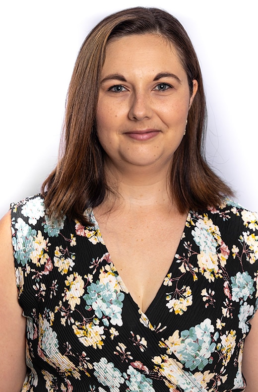 A portrait photograph of a middle aged woman