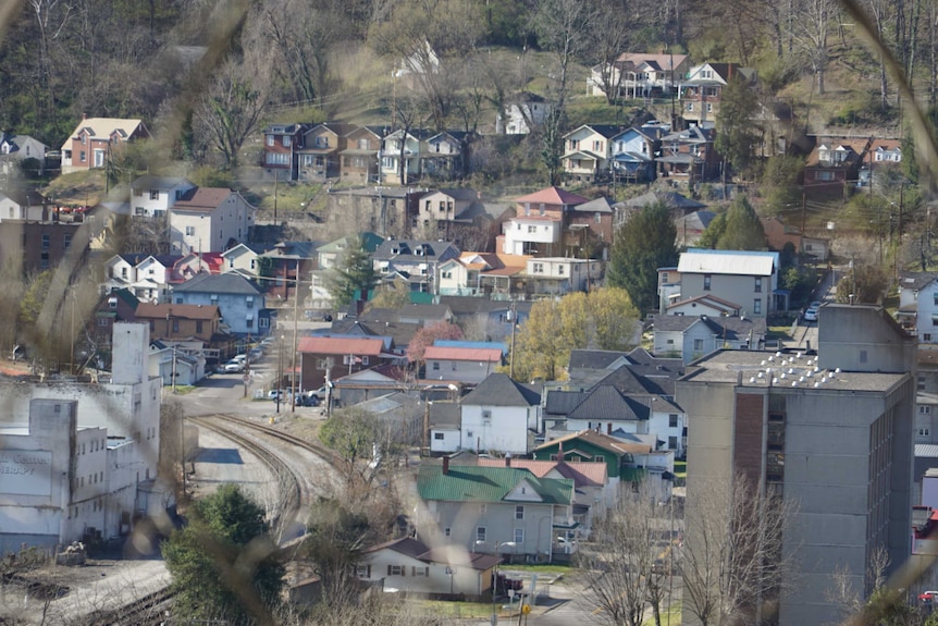 An aerial shot shows the dilapidated houses of williamson in west virginia.