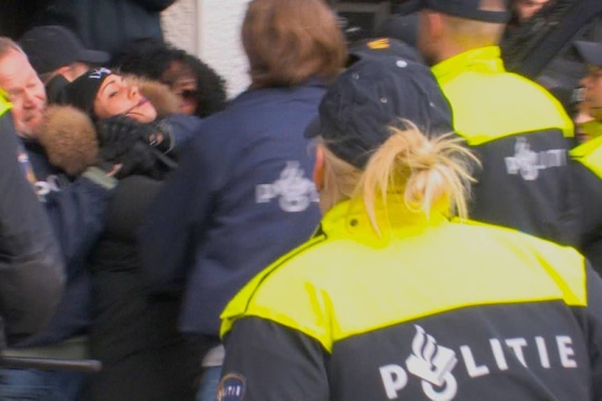 Dutch police removing anti-Black Pete protesters in Rotterdam.