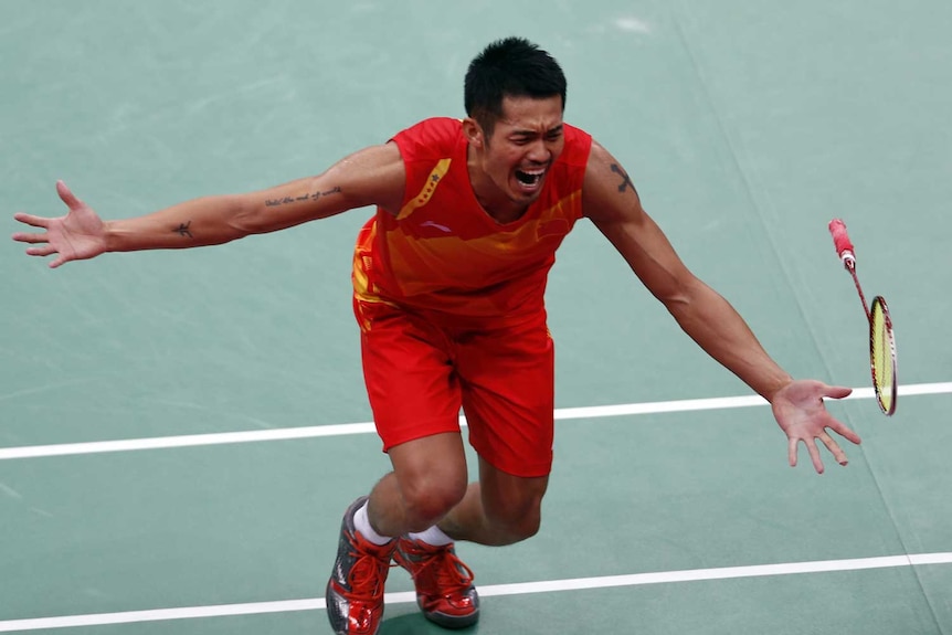 China's Lin Dan celebrates winning his men's singles badminton gold medal