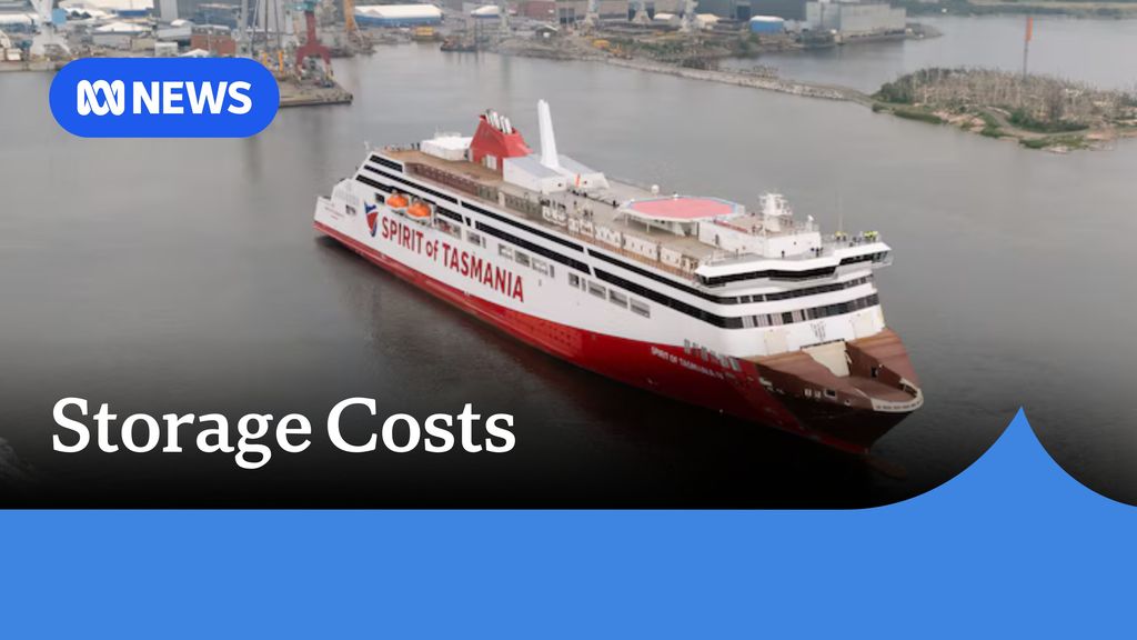 Storage Costs: A Spirit of Tasmania red and white ferry in a port.