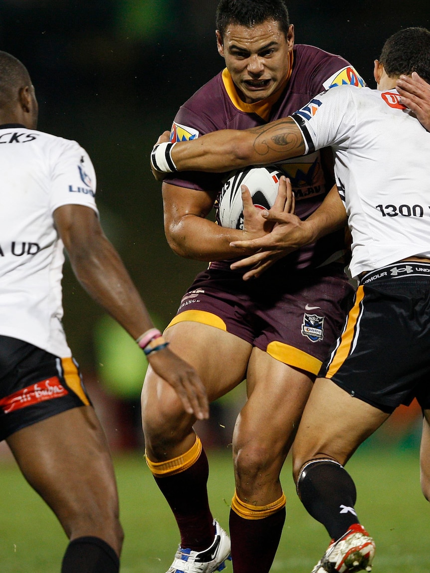 Sideline beckons ... Ben Te'o's shoulder charge knocked out the Tigers' Matt Groat.