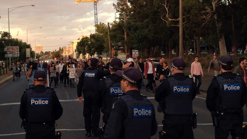 Behind police lines at East West Link protest