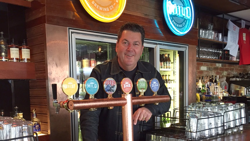 Northbridge Brewing Company director Michael Keiller behind the bar
