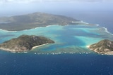 A drone shot of a tropical island
