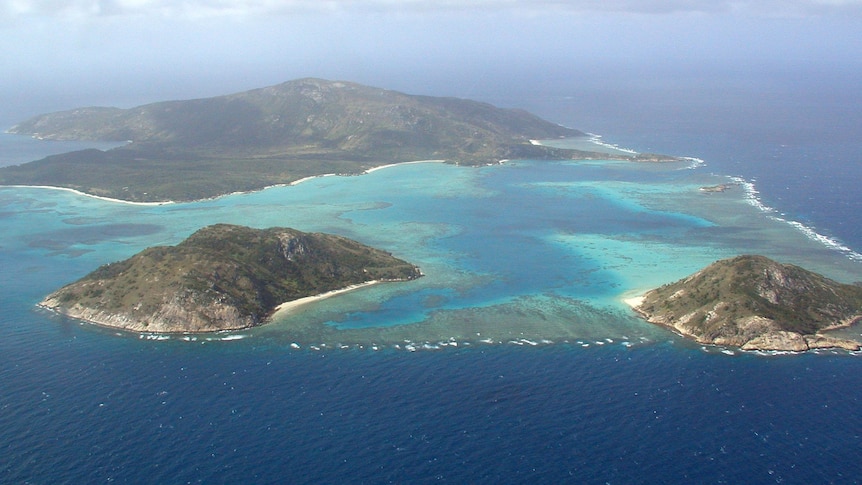 A drone shot of a tropical island