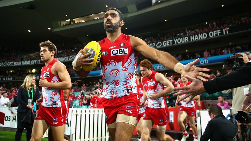 Sydney Swans' Adam Goodes leads his team out in round nine, 2015 against Carlton at the SCG.