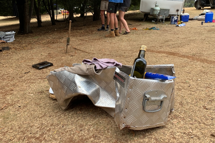 Damaged steel box at a campground.