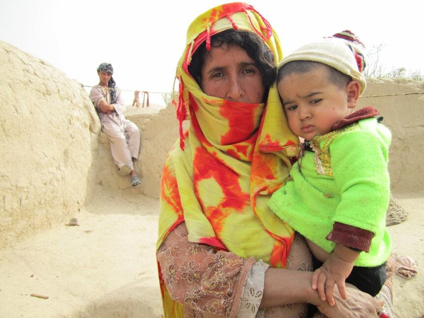 An Afghan woman and her child photographed in Jawzjan province.
