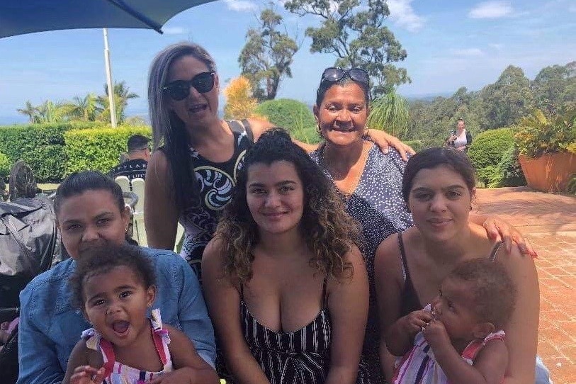 20-year-old Bundjalong woman Kristie-Lee Watego with her family.
