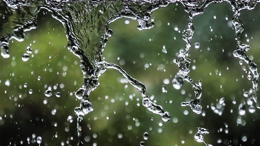 rain cascading off roof