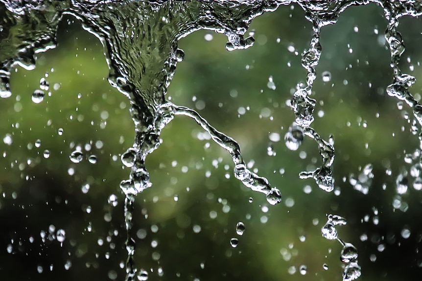 rain cascading off roof