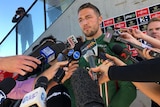 South Sydney's Sam Burgess addresses the media at Redfern Oval.